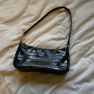 90s vibe black shoulder purse, faux crocodile print in black.